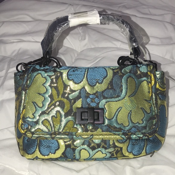 Steve Madden Handbags - STEVE MADDEN small super stylish flower fabric bag.